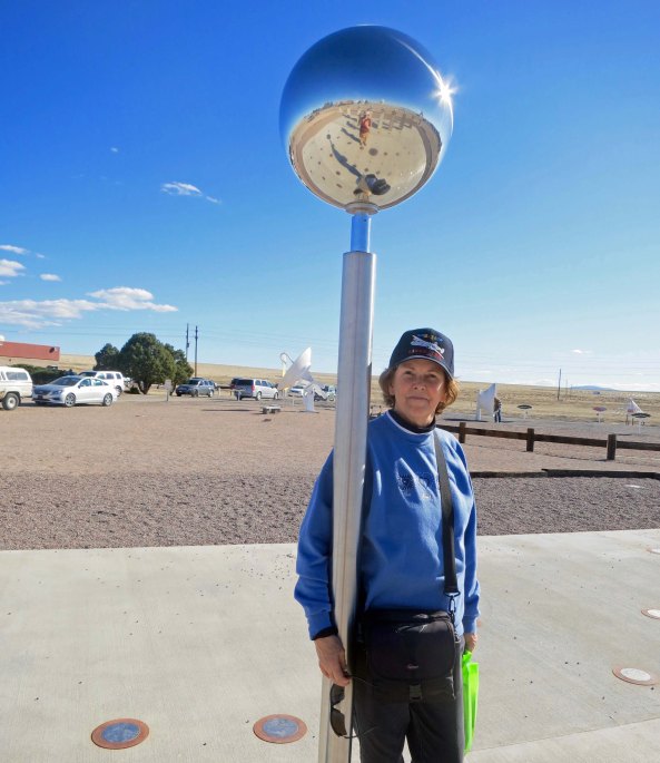 Peggy snuggles up to a sundial at the VLA, counting down the hours until she can watch "Independence Day" again.