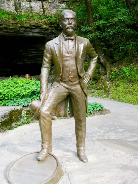 A sculpture of Jack Daniels with his foot resting on a barrel. The state was located on a rock. It's title was Jack Daniels on the Rocks.