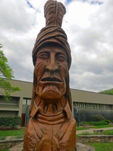 Wood sculpture of a crying Cherokee representing the Trail of Tears in Cherokee, North Carolina.
