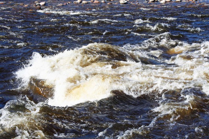 Spring time flows guaranteed rapids when Peggy and I re-drove the route.