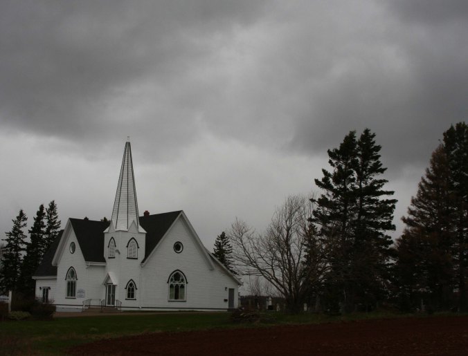 The dark, stormy skies were back the next morning. I liked the drama they created in this photo of a church.