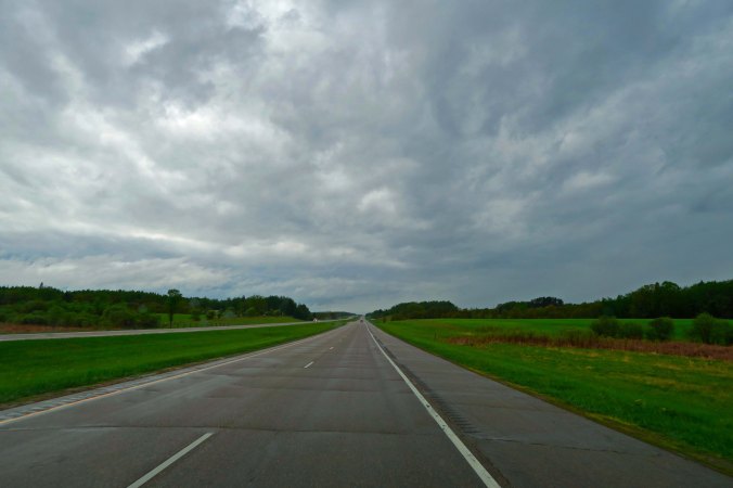 Minnesota Highway 2 leads me into North Dakota, more stormy weather, and the sneakiest dog in 10,000 miles.