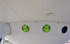 Aliens peak out window of flying saucer in front of information center in Moonbeam, Ontario Canada.
