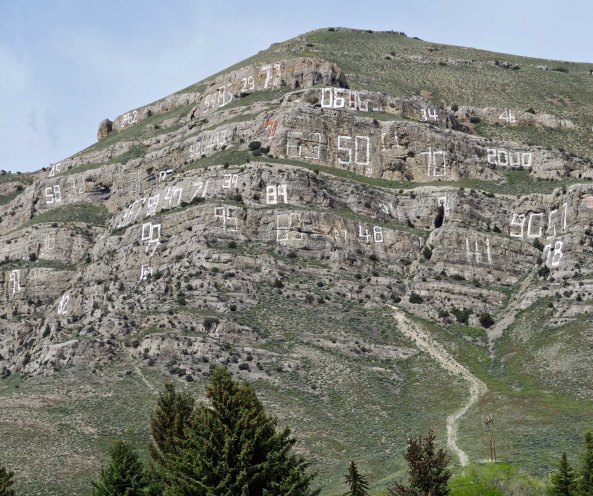 This mountain next to Arco features the local high school's graduating classes going back to the early 1900s.