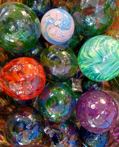 Groups and individuals have an opportunity to attend a workshop and create simple glass work of their own, such as these Christmas ornament.