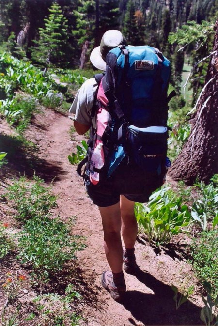 And here's Peggy hiking down one of the trails in the Granite Chief Wilderness. The pack looks almost as big as she is.