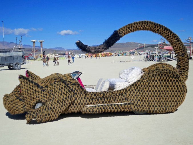 A side view of the cat car mutant vehicle at Burning Man.
