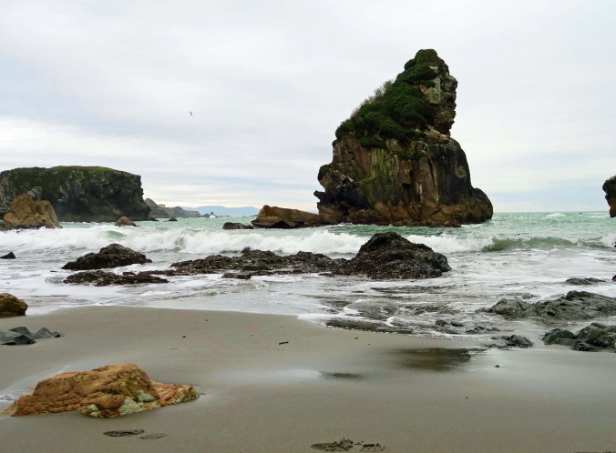 Photo of sea stack rock by Curtis Mekemson at Harris Beach State Park on the Pacific Ocean.