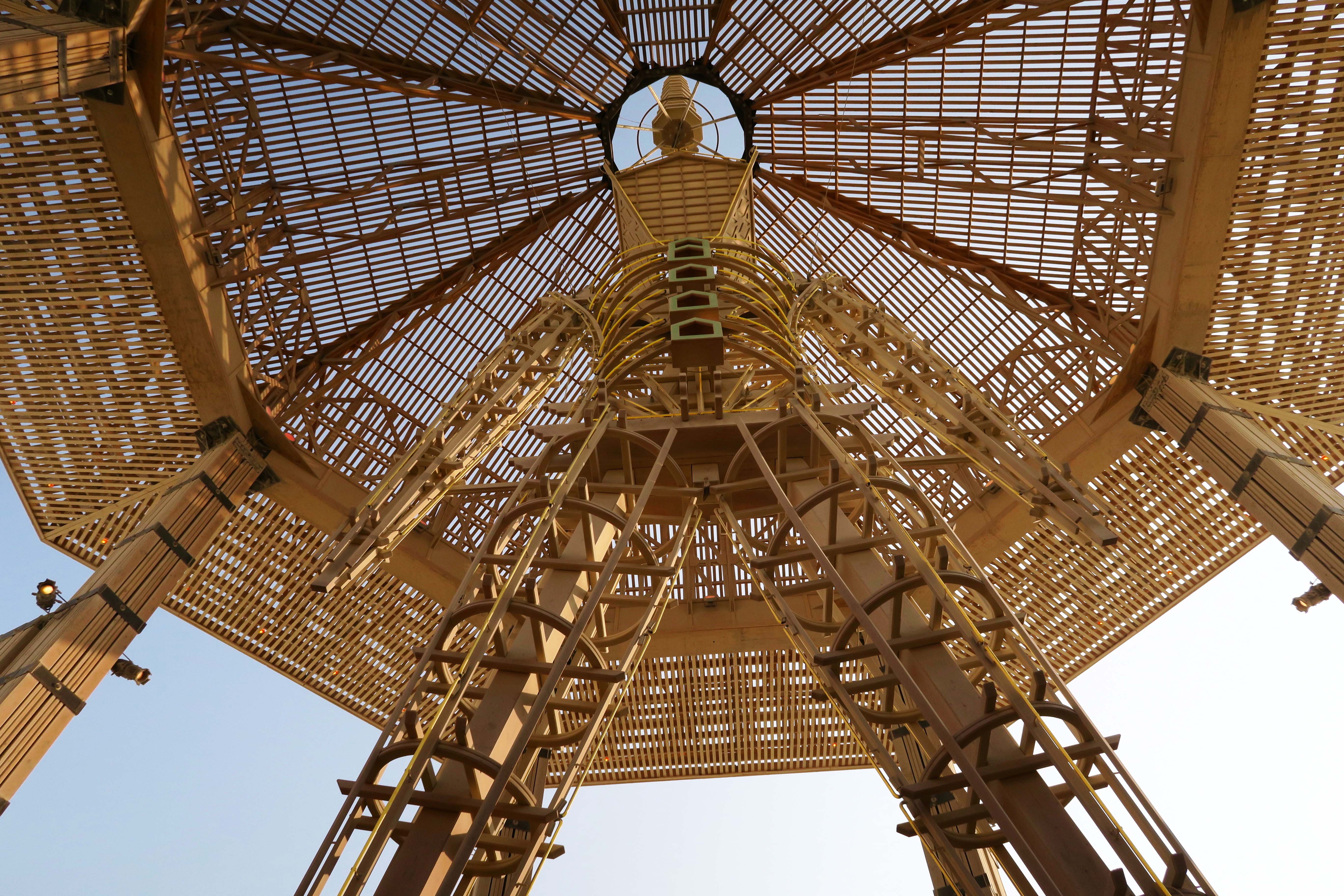 Looking up at Man in Temple of the Golden Spike, Burning Man 2017