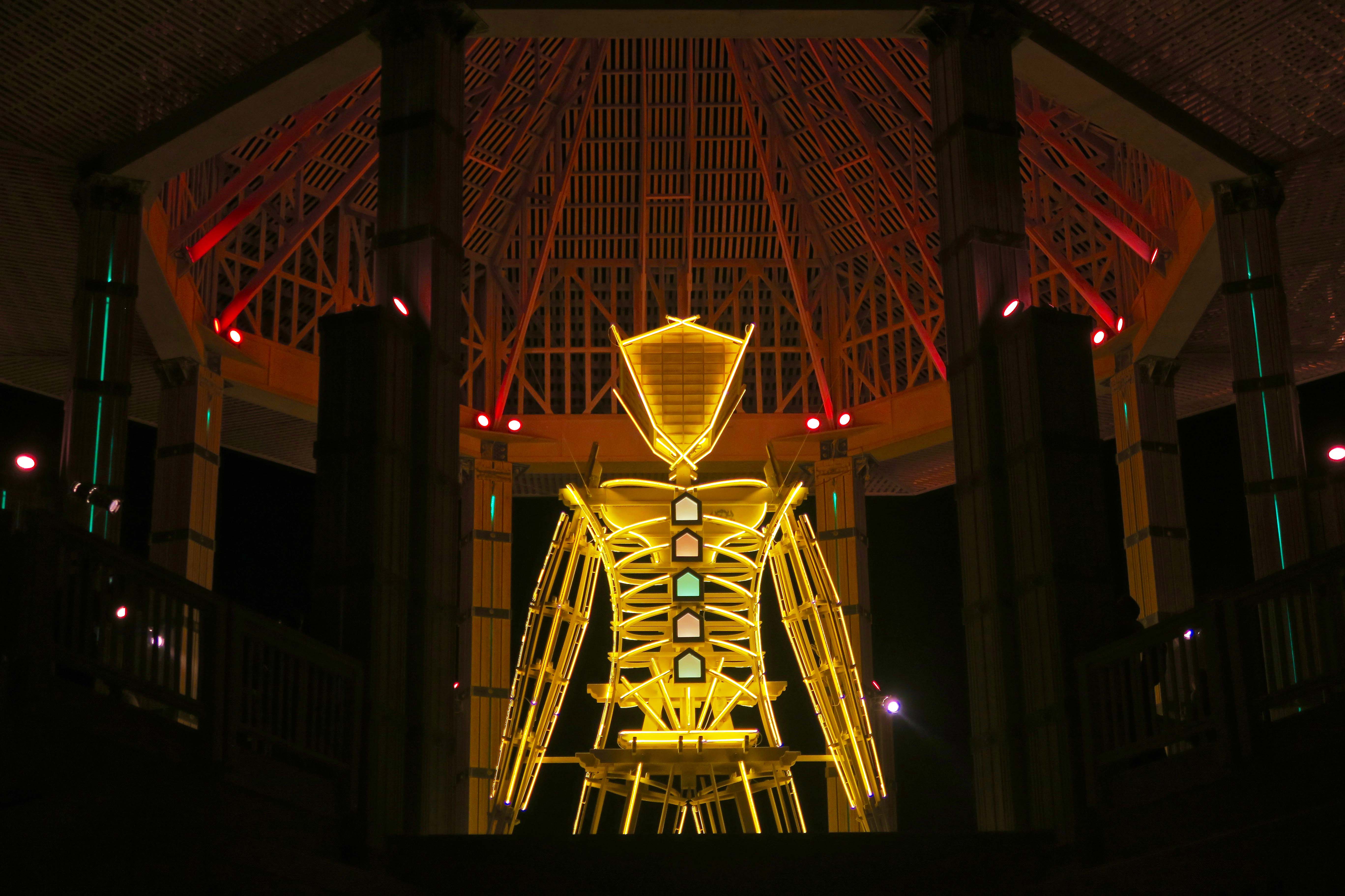 Man in Temple of Golden Spike at night 3, Burning Man 2017