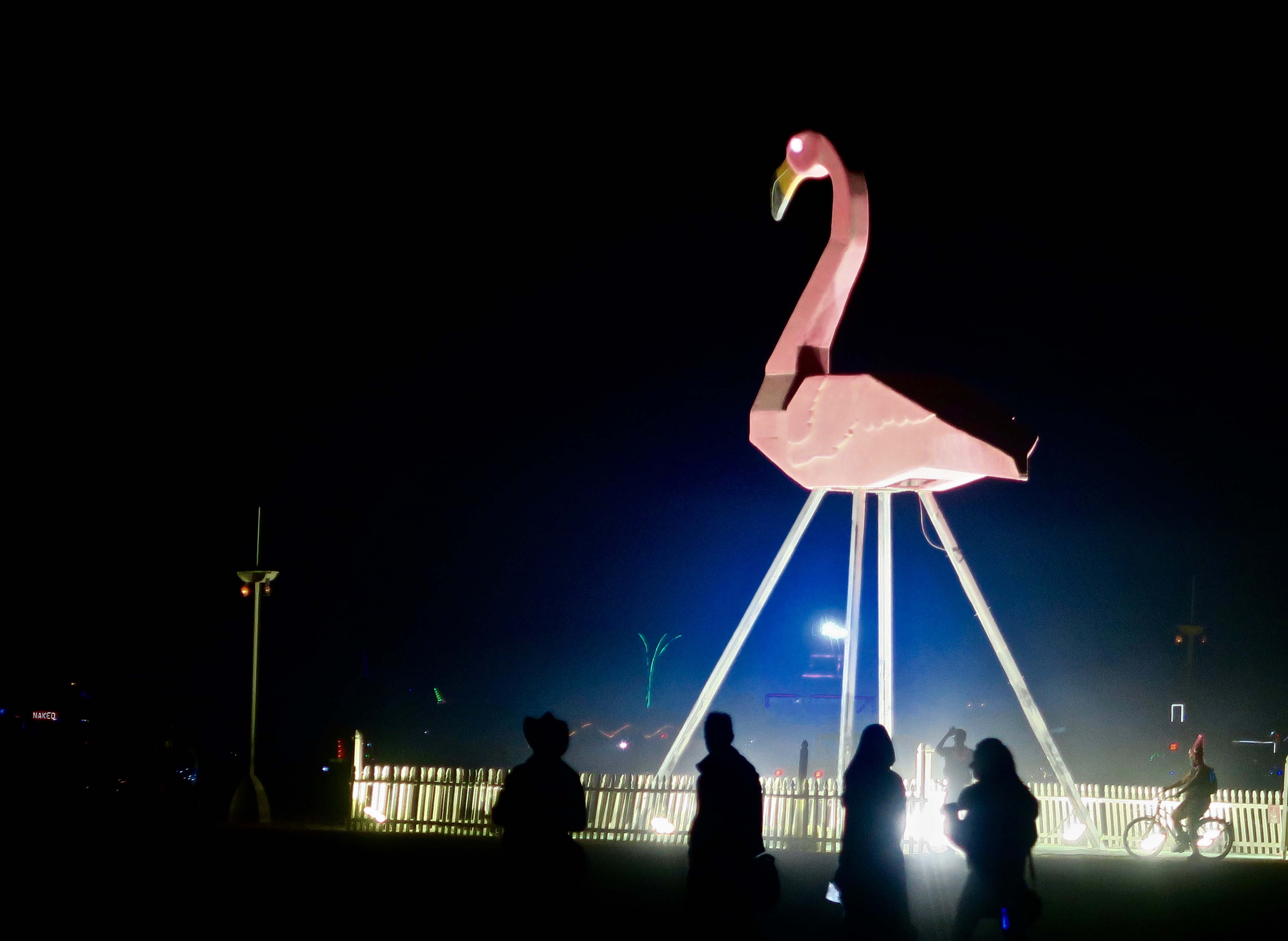 Nighttime giant flamingo at Burning Man 2017