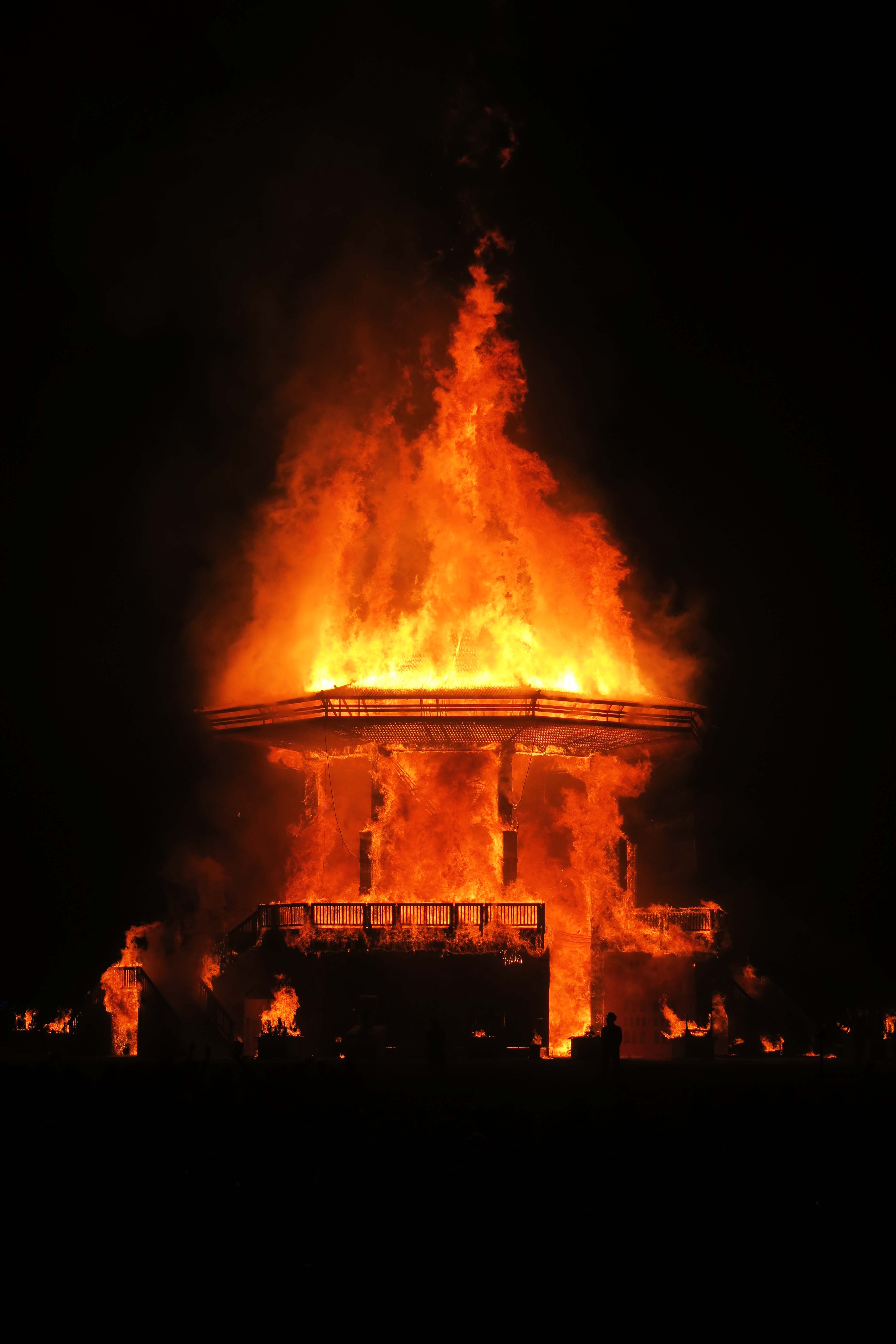 Temple of Golden Spike shoots flames into the air, Burning Man 2017