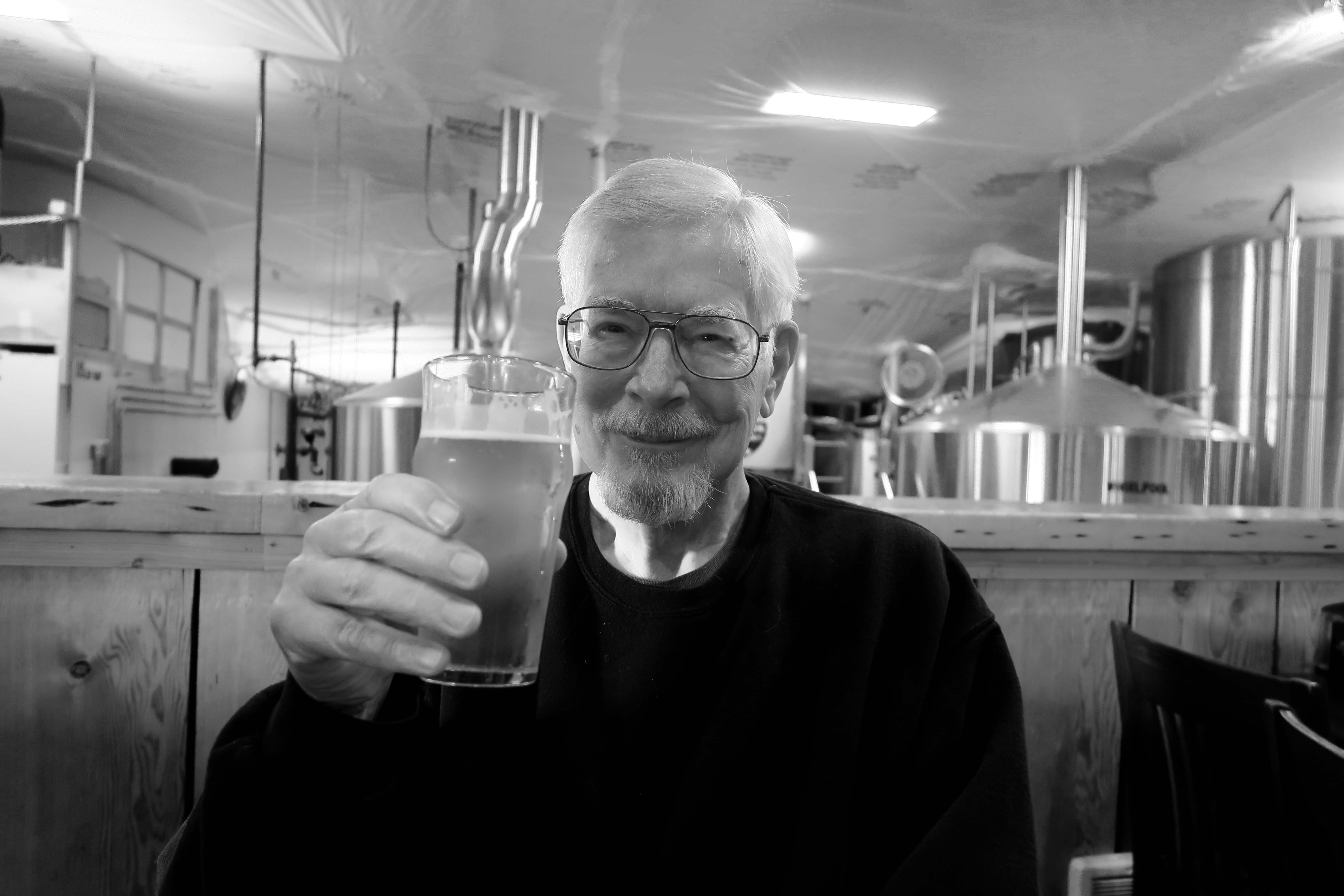 Curt Mekemson enjoying a pint at Pelican Brewing Company in Tillamook, Oregon.
