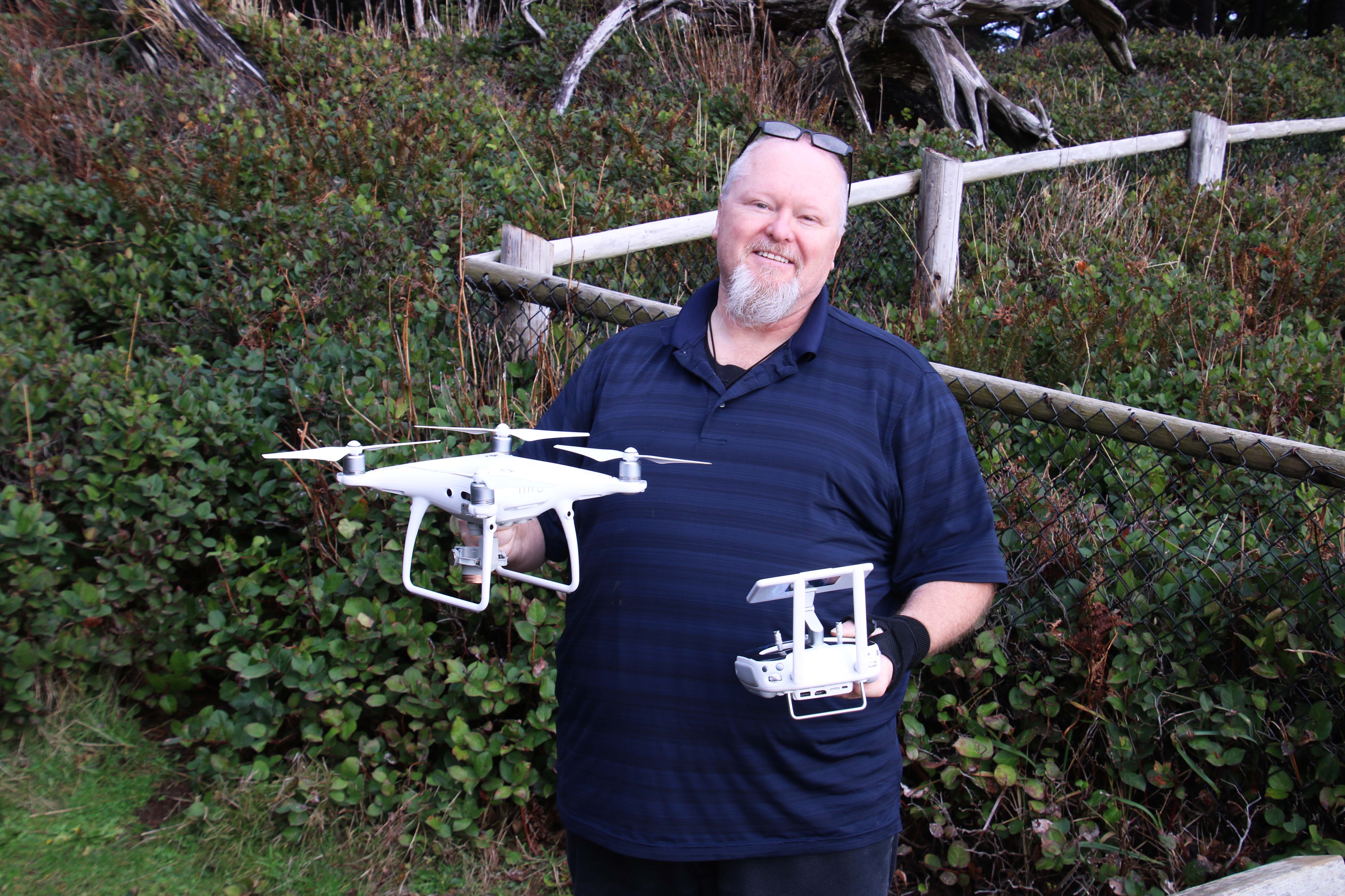 Man with drone at Cape Meares.