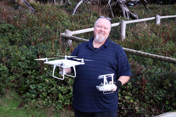 Man with drone at Cape Meares.