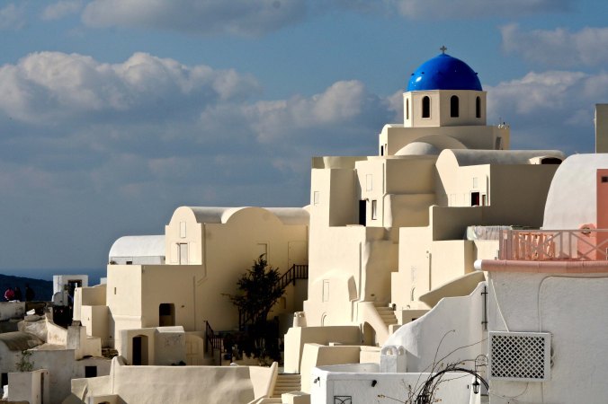 Blue topped church and other buildings in Santorini P