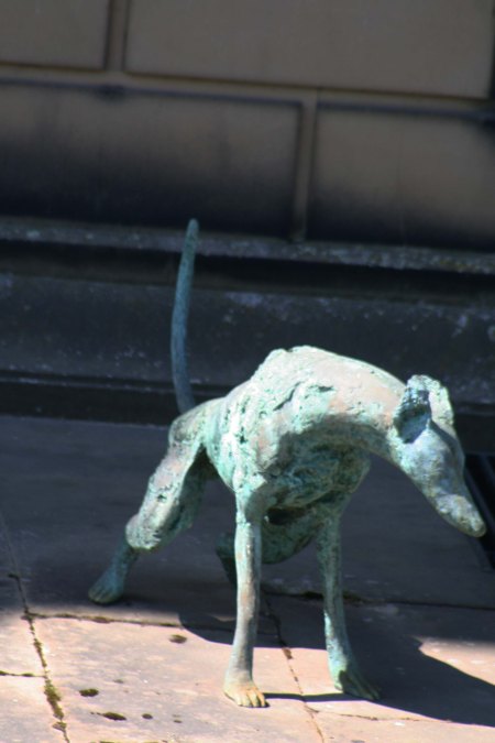 Dog sculpture peeing at Chatsworth House