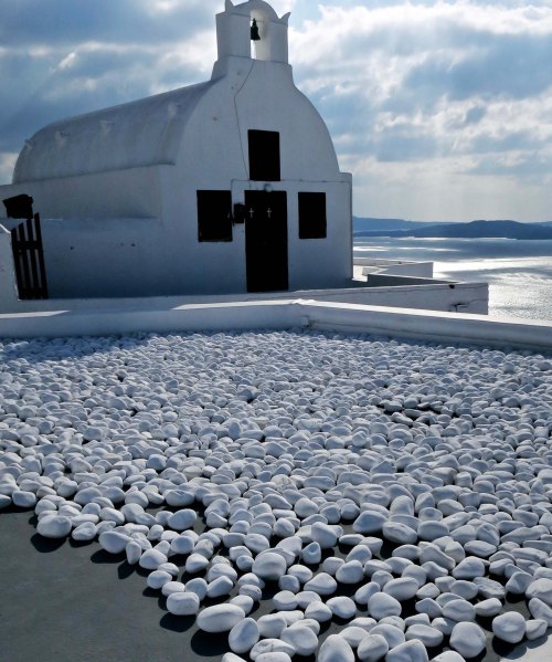 White rocks and chapel on the Greek island of Santorini. Photo by Curtis Mekemson.