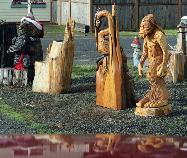 Sasquatch hangs out with carved heron