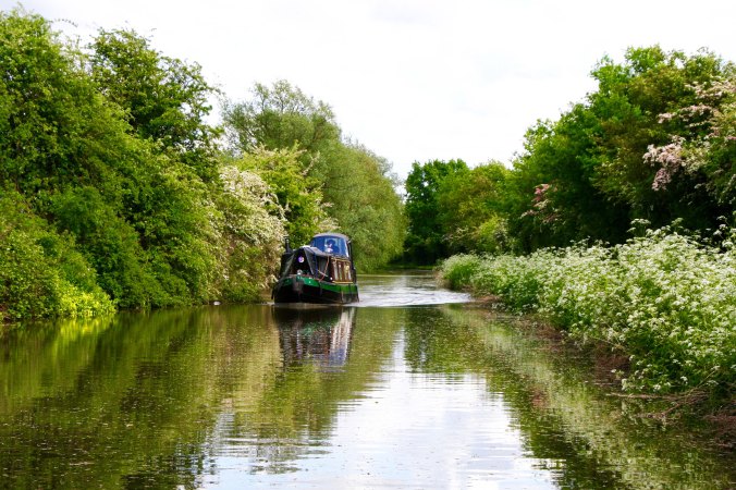 Narrowboat with rain cover on Trent and Mersey Canal
