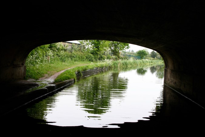 Scenic view from under bridge on Trent and Mercy Canal