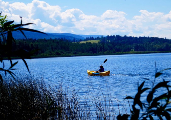 Peggy kayaking on Dragon Lake, Quesnel, BC