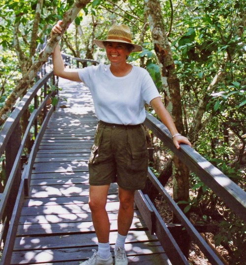 Peggy Mekemson on jungle walkway