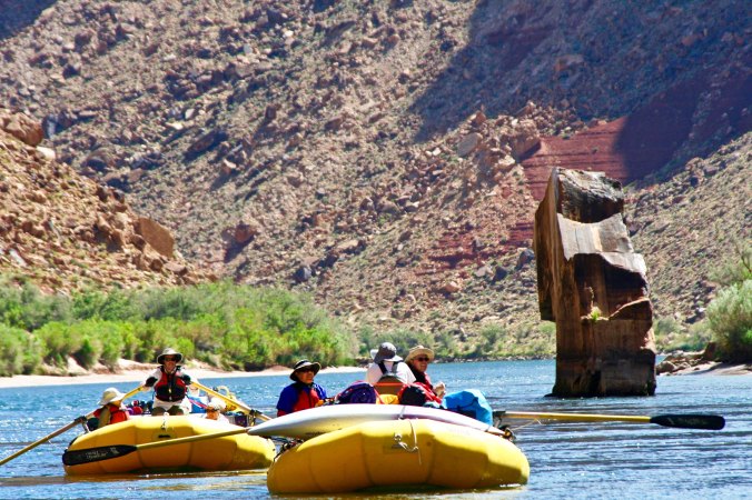 Rafters pass Ten Mile Rock on the Colorado River in the Grand Canyon