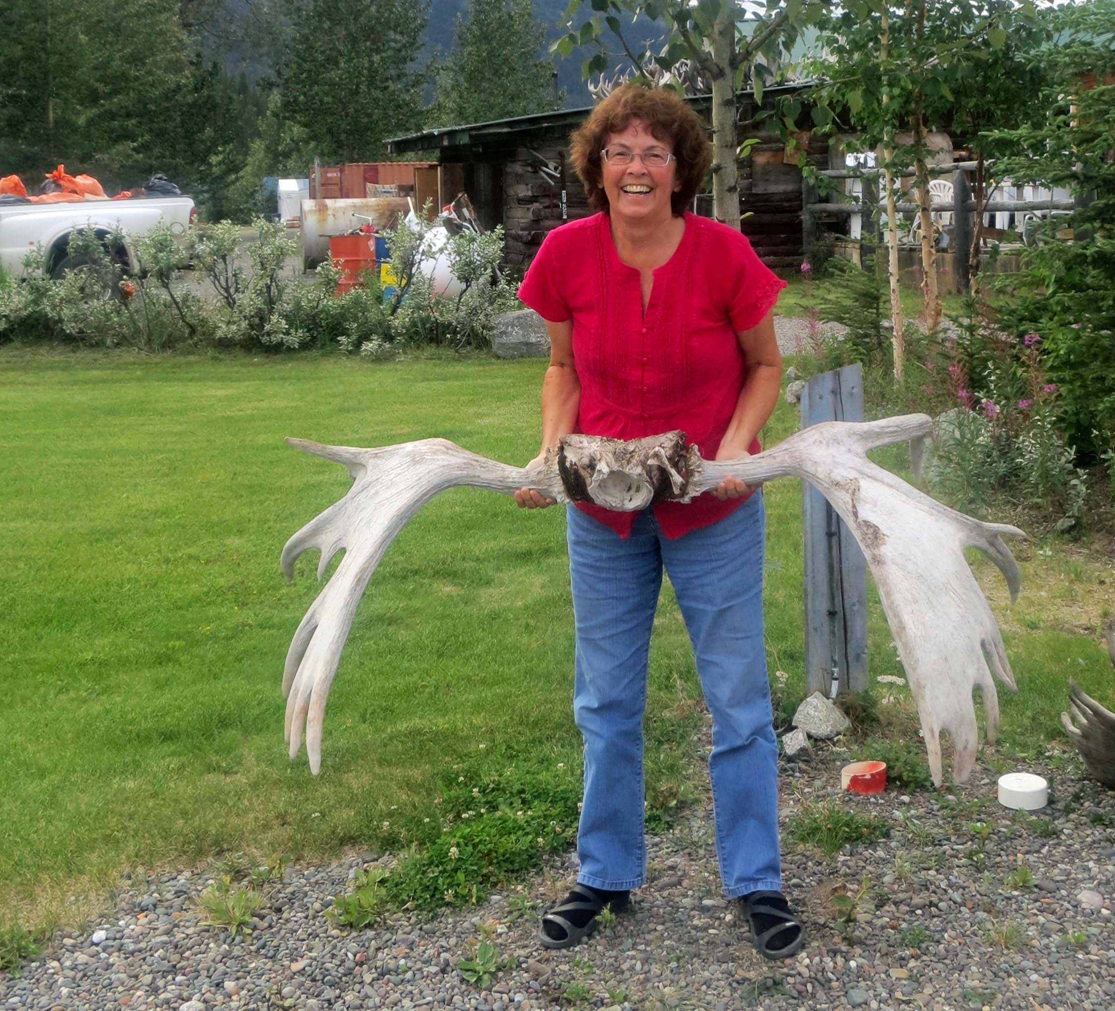 Peggy with moose antlers at White River, YT