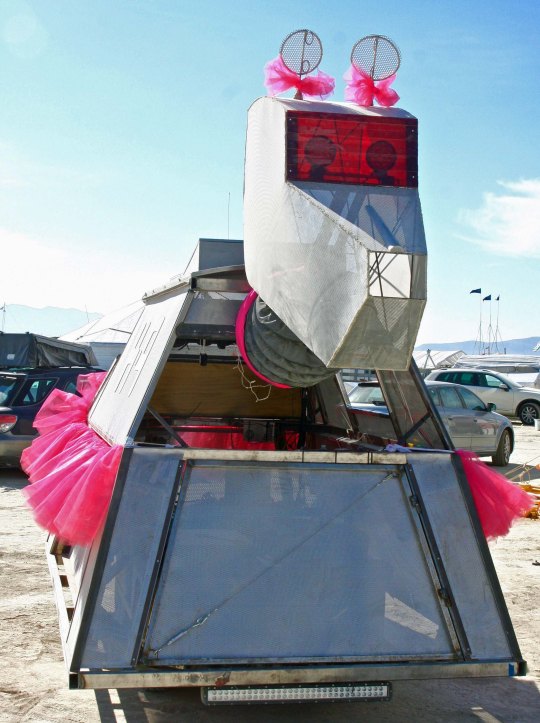 Tutu wearing dog mutant vehicle at Burning Man.