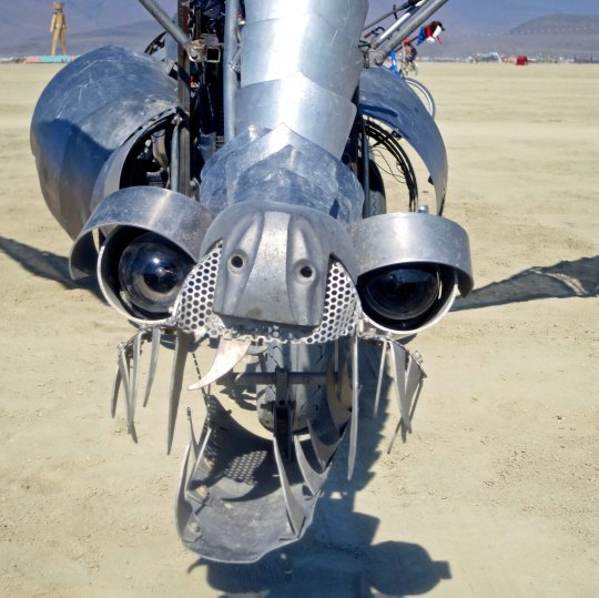 Silver dragon mutant vehicle at Burning Man.