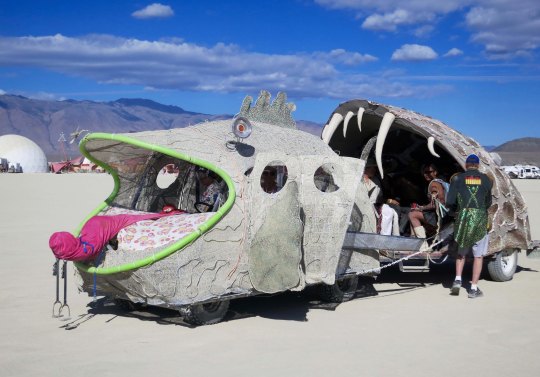 A fish eating fish mutant vehicle at Burning Man.