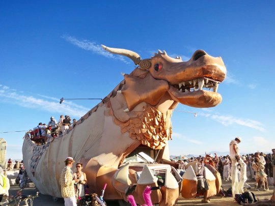 Large claws on golden dragon mutant vehicle at Burning Man.
