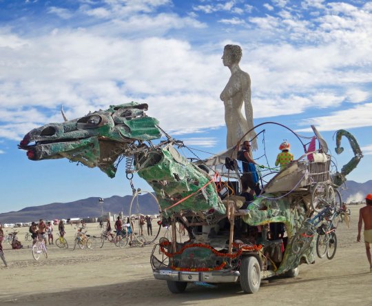 Burning Man green dragon mutant vehicle.