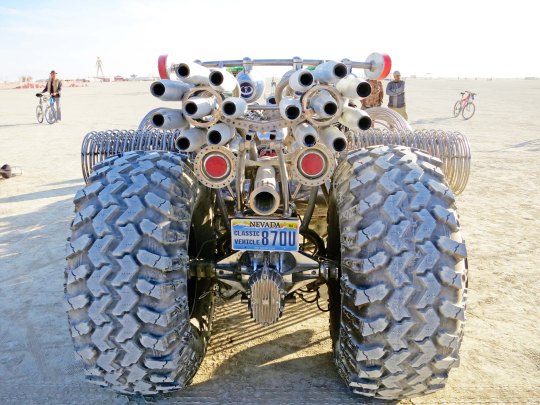 Exhaust pipes on mutant vehicle hot rod at Burning Man.