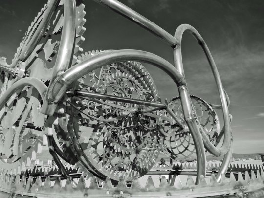 Gears on top of modern day hotrod at Burning Man.