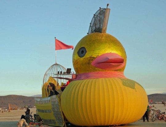 Large canary mutant vehicle at Burning Man.