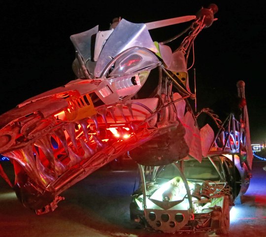 Red snouted mutant vehicle dragon at Burning Man.