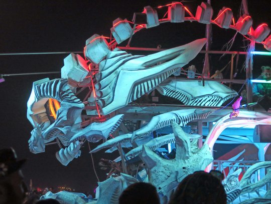 Impressive blue-green dragon mutant vehicle at Burning Man.