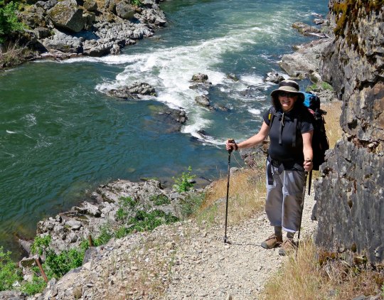 Peggy Mekemson hiking along the Rogue River Trail.