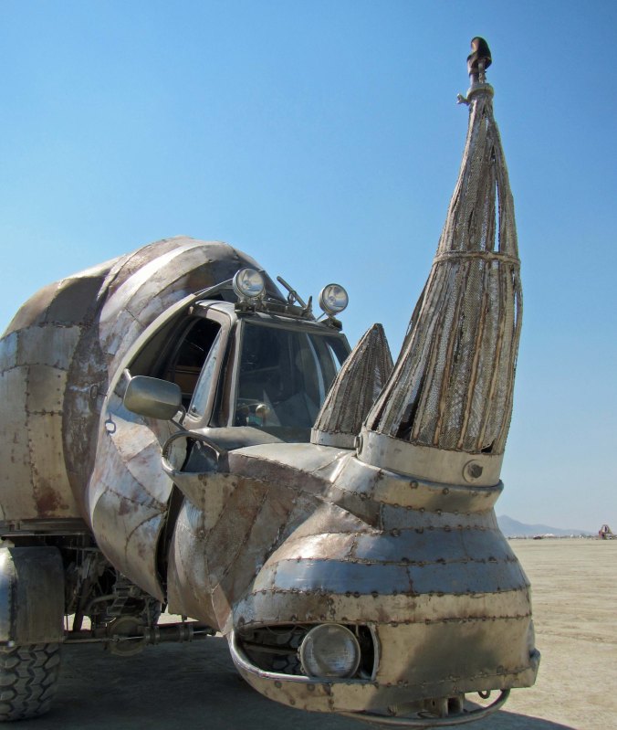 Head shot of large mutant rhino vehicle at Burning Man.